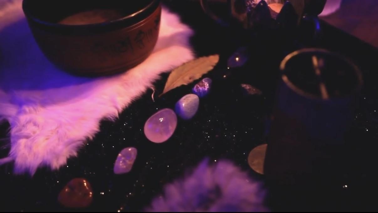 Crystals and bowl in candlelight